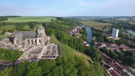 Church-on-a-hill-in-a-rural-town-by-drone.-Location-France-Dun-sur-Meuse